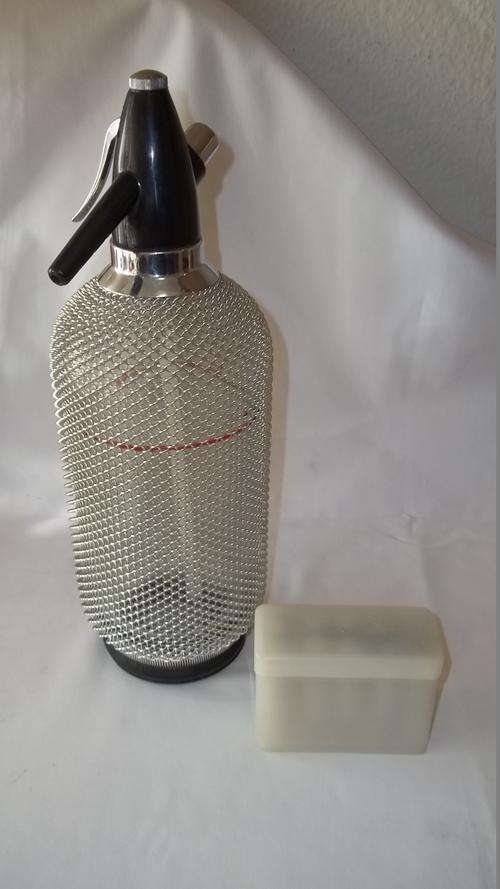 A MAGNIFICENT LARGE GLASS AND WIRE-MESH SODA SIPHON/ SELTZER WITH BULLETS IN IMMACULATE CONDITION