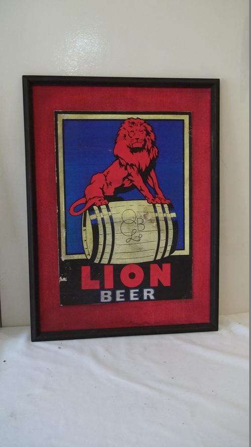 A VERY UNUSUAL FRAMED "LION LAGER" BEER BAR POSTER - QUITE AN AWESOME BAR ACCESSORY!!