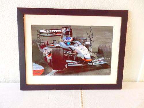 AN AWESOME 2002 MCLAREN WEST FORMULA ONE CAR 6 ORIGINAL PHOTOGRAPH WITH KIMI RAIKKONEN'S AUTOGRAPH