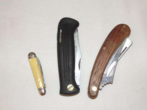 A STUNNING SET OF THREE COLLECTIBLE POCKET KNIVES NAMELY, FURY, KERSHAW AND RICHARDS