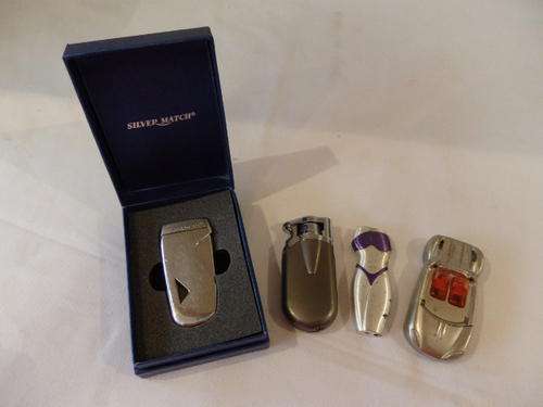 AN AWESOME SET OF FOUR COLLECTIBLE NOVELTY  CIGARETTE LIGHTERS