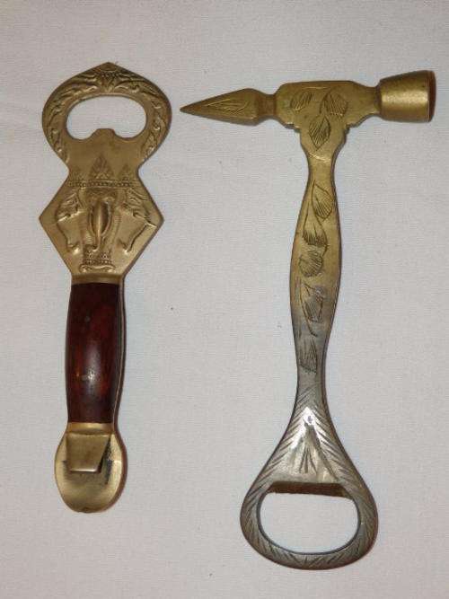 AN EXQUISITE SET OF TWO VINTAGE MATAL BOTTLE OPENERS AND ICE PICK