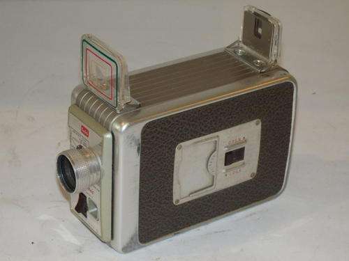 A FANTASTIC VINTAGE KODAK BROWNIE 8mm MOVIE CAMERA WITH TWO ADDITIONAL LENSES AND LEATHER POUCH