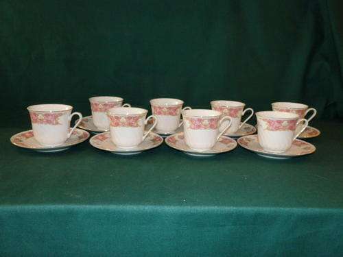 A STUNNING SET OF EIGHT RICHWOOD OF USA PORCELAIN CUPS AND SAUCERS WITH A WILD FLOWER PATTERN