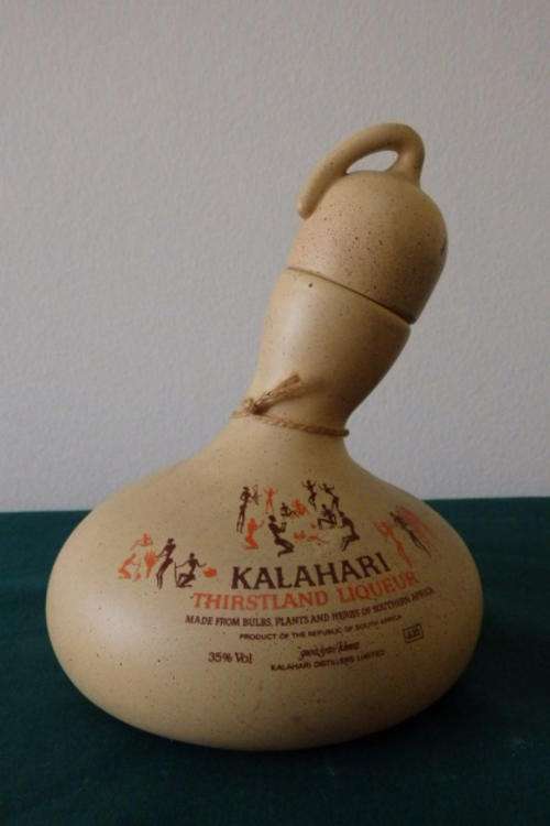 AN AWESOME "KALAHARI THIRSTLAND LIQUEUR" IRONSTONE DECANTER/ BOTTLE IN THE SHAPE OF A KALABASH