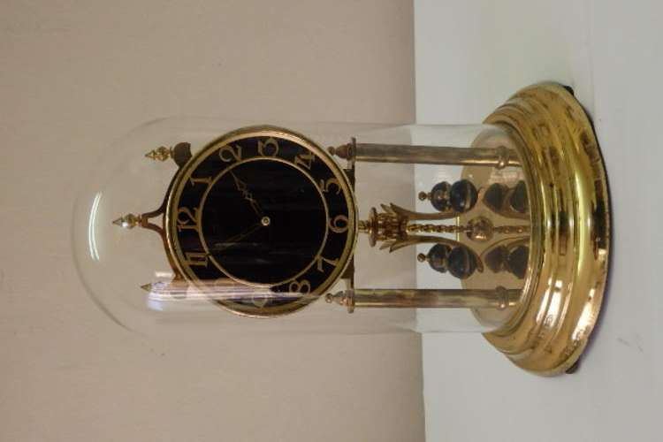 A STUNNING VINTAGE WEST GERMAN MADE KUNDO WIND UP DOME CLOCK WITH A BLACK FACE