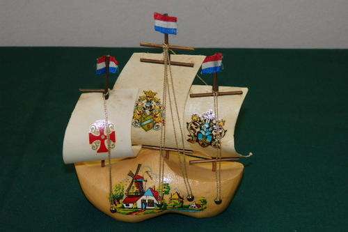 A FANTASTIC ORNAMENTAL DUTCH "SHIP" WITH A CLOG AS THE HULL AND DUTCH COAT OF ARMS ON THE SAILS
