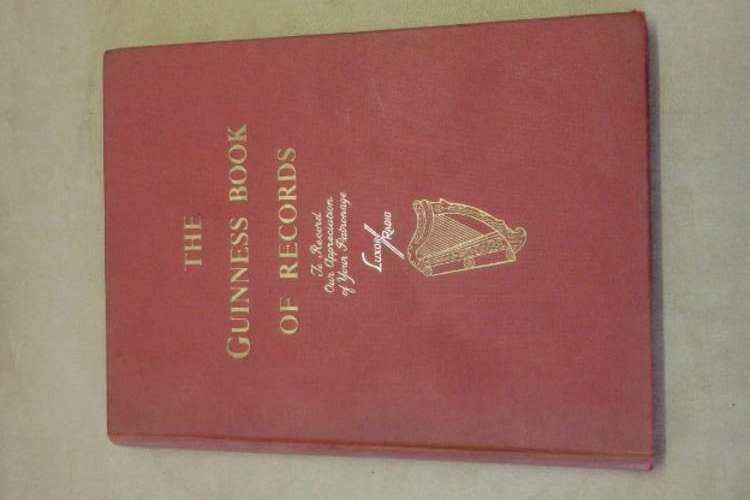 A FANTASTIC VINTAGE 1958 COPY OF THE GUINNESS BOOK OF RECORDS = WOW!!!