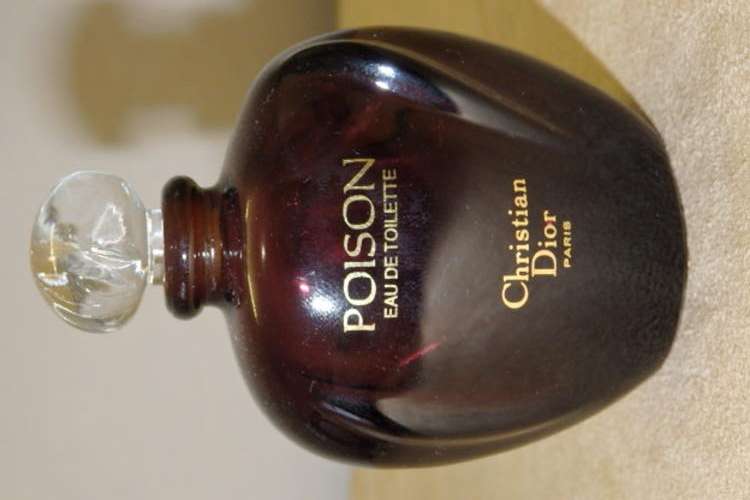 AN AWESOME CHRISTIAN DIOR OF PARIS POISON EAU DE TOILETTE PERFUME BOTTLE