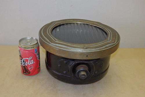 AN INCREDIBLE AND RARE VINTAGE CAR HEADLAMP HOUSING CASE WITH SILVER PLATE ON BRASS HEADLAMP RING