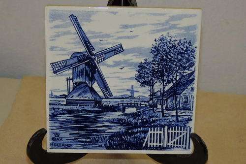 A GORGEOUS HAND PAINTED DELFT OF HOLLAND BLUE AND WHITE TRADITIONAL WINDMILL THEME WALL TILE