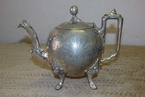 AN VERY UNUSUAL ROUND VINTAGE/ ANTIQUE? TEA-FOR-ONE TEAPOT WITH ENGRAVED DETAILING
