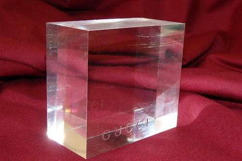 AN INCREDIBLE ORIGINAL AND AUTHENTIC "GUCCI PERFUMES" BRANDED PERSPEX PAPERWEIGHT