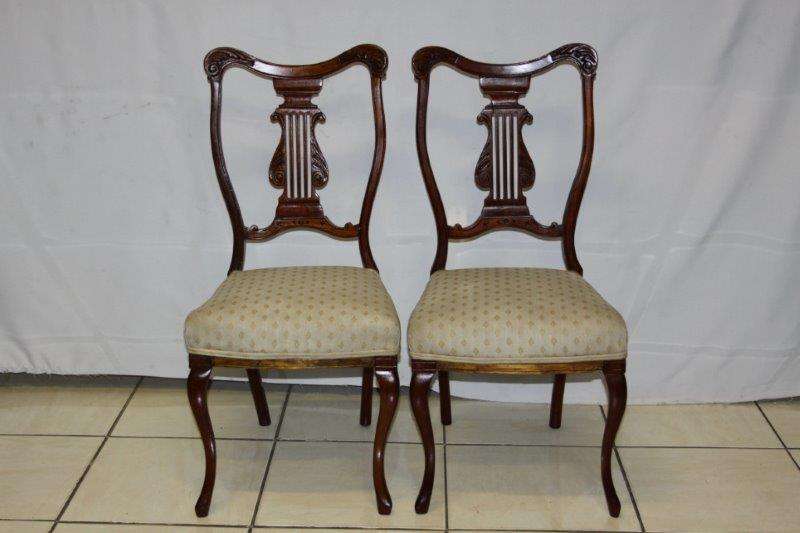TWO FANTASTIC AMERICAN HARP BACK CARVED DECORATIVE CHAIRS IN GREAT CONDITION FOR THE AGE! bid/chair