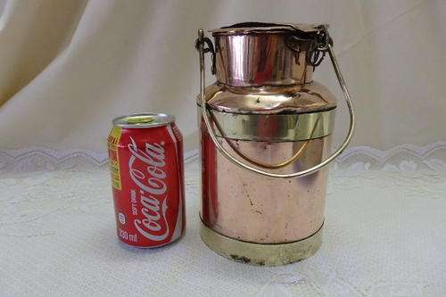 A FANTASTIC AND CHARMING ANTIQUE COPPER AND BRASS CREAM CANISTER WITH LOADS OF CHARACTER