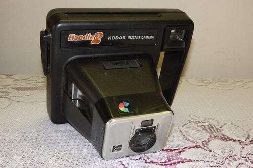 AN AWESOME VINTAGE (LATE 1970's) ORNAMENTAL KODAK HANDLE 2 INSTANT CAMERA