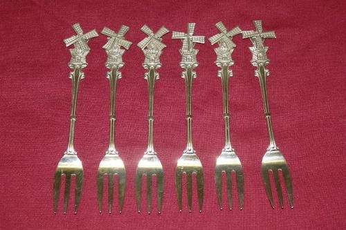 A FABULOUS SET OF SIX ALPACA SILVER PLATED CAKE FORKS WITH WINDMILL DECALS ON THE HANDLES