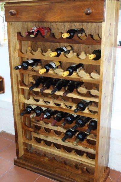 A STUNNING 63-BOTTLE SOLID AFRICAN BLACKWOOD WINE RACK WITH A LARGE STORAGE DRAW ON TOP!!! AWESOME!!