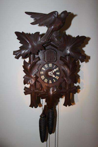AN INCREDIBLE VINTAGE GERMAN MADE BLACK FOREST CUCKOO CLOCK IN PERFECT WORKING CONDITION!!! AWESOME!