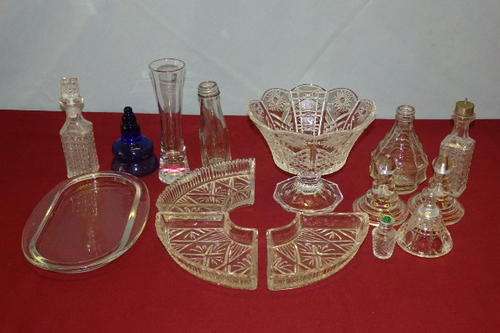 AN AWESOME COLLECTION OF MIXED GLASSWARE PIECES INCLUDING BOWLS, CONDIMENT BOTTLES AND MORE