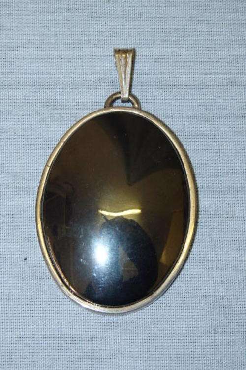 AN AMAZING "OVERSIZED" STERLING SILVER PENDANT WITH A HUGE BLACK OBSIDIAN STONE