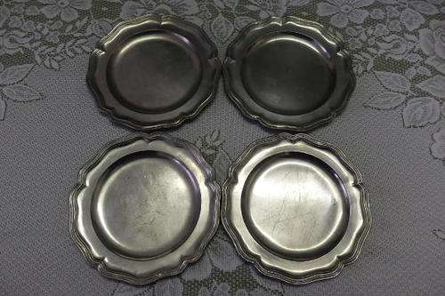 A MAGNIFICENT COLLECTION OF FOUR ANTIQUE (c1927) HALLMARKED PEWTER SCALLOPED PLATES bid.plate