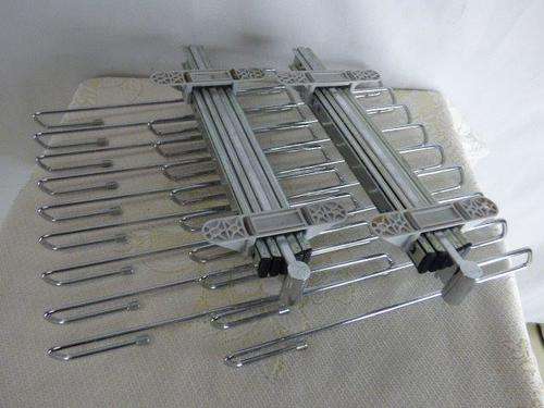 A LOVELY METAL MULTI FUNCTION TROUSER HANGER FOR YOUR WARDROBE. SPACE SAVER!!