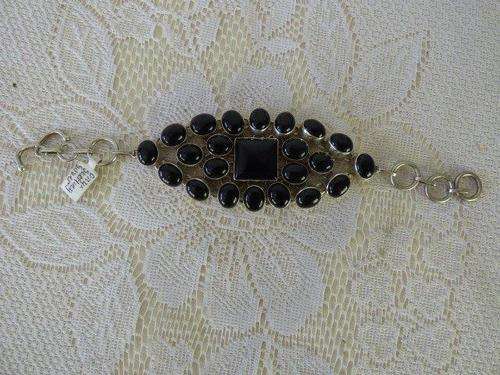 A BEAUTIFUL SILVER (925) BRACELET WITH 22 SMALL & 1 LARGE GORGEOUS SQUARE ONYX STONE. STUNNING!!