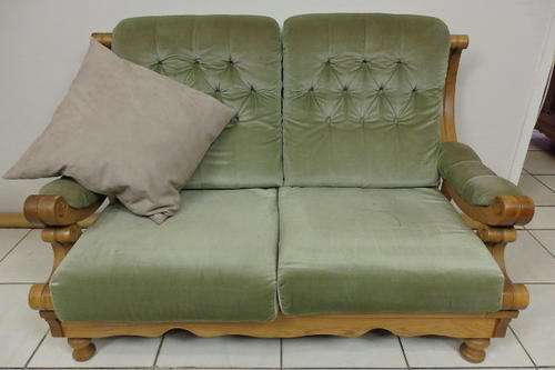 AN AMAZING SOLID OAK AND "SOFT GREEN" UPHOLSTERED TWO SEATER COUCH IN GREAT CONDITION