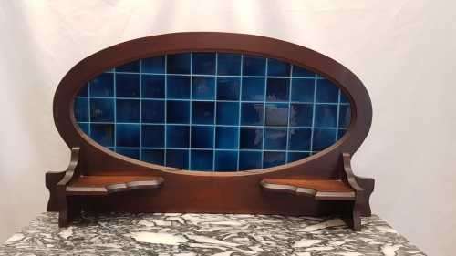 A stunning antique solid oak wash stand with cobalt-blue tiles, grey granite top and bobbin legs