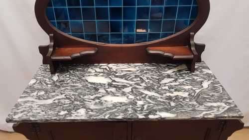 A stunning antique solid oak wash stand with cobalt-blue tiles, grey granite top and bobbin legs