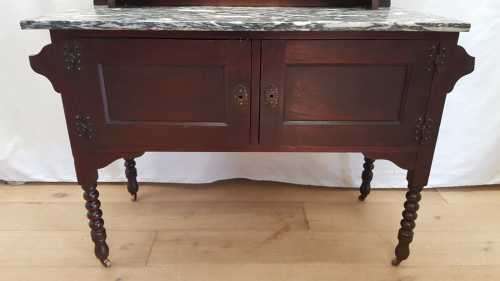 A stunning antique solid oak wash stand with cobalt-blue tiles, grey granite top and bobbin legs