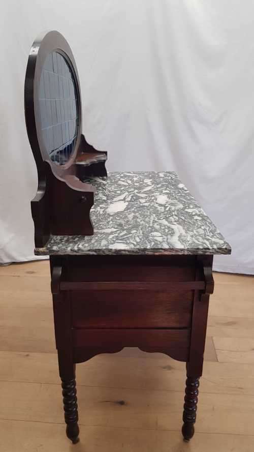 A stunning antique solid oak wash stand with cobalt-blue tiles, grey granite top and bobbin legs