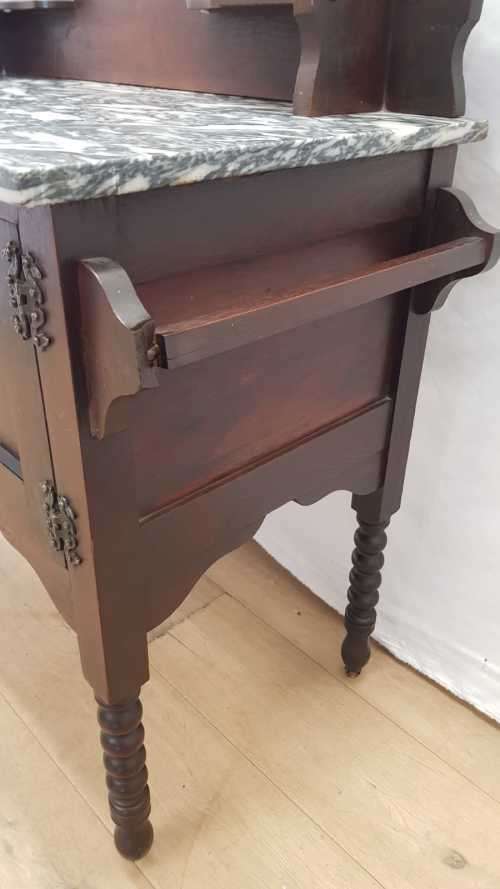A stunning antique solid oak wash stand with cobalt-blue tiles, grey granite top and bobbin legs