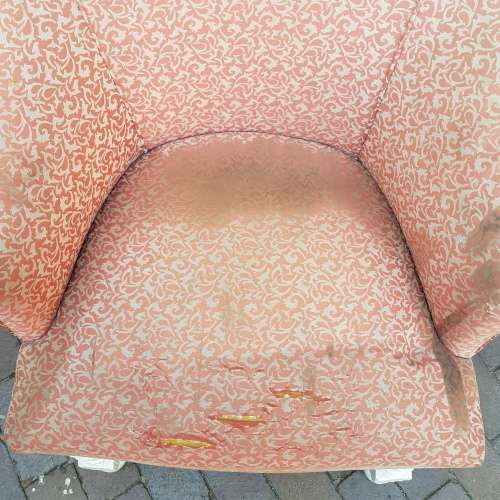 A stylish wrought iron and wood base armchair for restoration