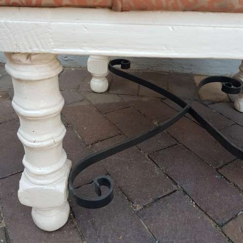 A stylish wrought iron and wood base armchair for restoration