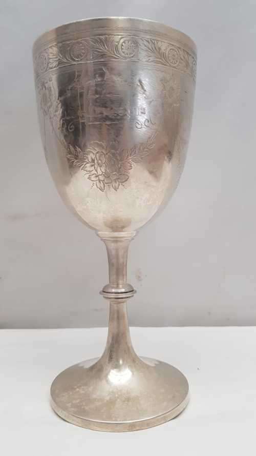 A beautiful antique (1910) hallmarked British sterling silver engraved chalice trophy