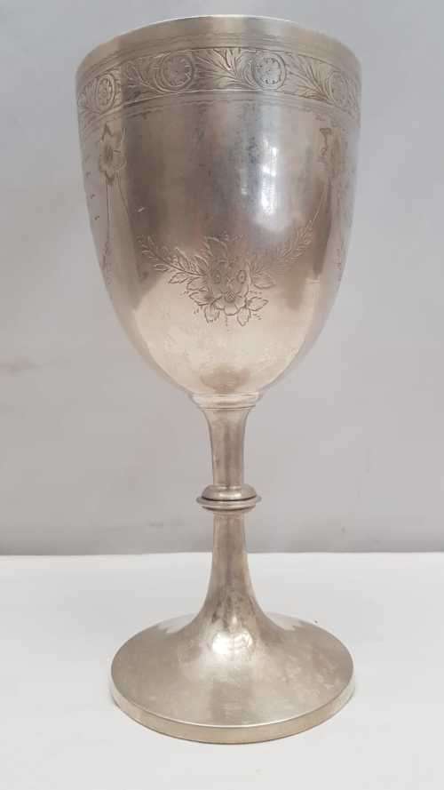 A beautiful antique (1910) hallmarked British sterling silver engraved chalice trophy