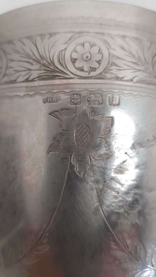A beautiful antique (1910) hallmarked British sterling silver engraved chalice trophy