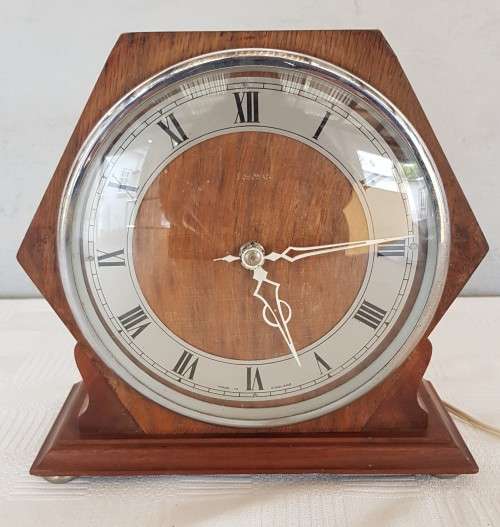 A vintage made in England electric clock