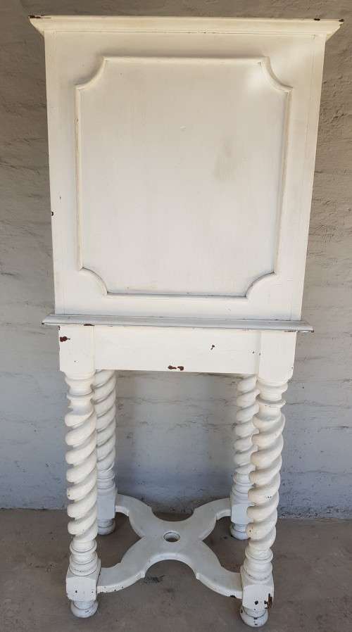 A painted white podium, solid timber