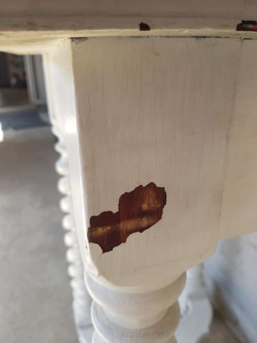 A painted white podium, solid timber