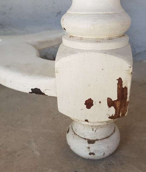 A painted white podium, solid timber