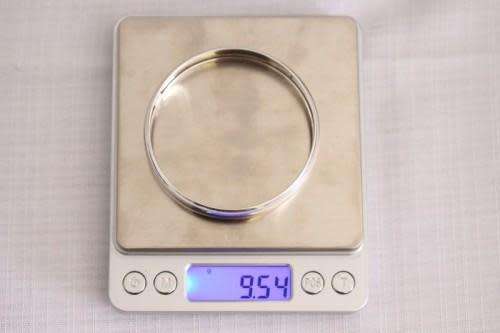 A stunning hand made Mexican 1.2cm-broad sterling silver (925) ladies bangle in great condition