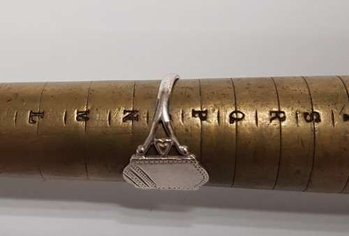 Three pretty stamped silver ladies rings