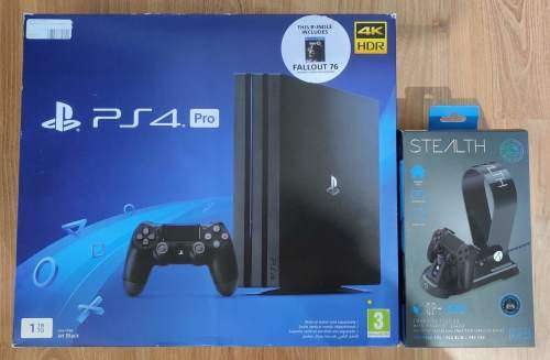 Sony PS4 Pro (UPGRADED to SSD) with charging station + headset stand - Original packaging