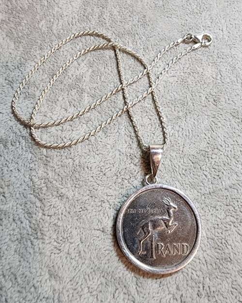 ***925 Sterling silver Necklace with R1 coin pendant.***