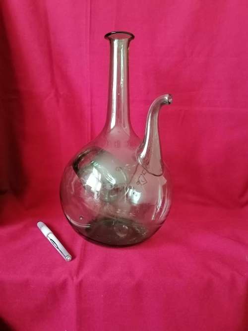 A vintage handblown Green Italian glass wine chiller / decanter /carafe with ice holder.