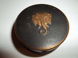 'WOW NICE SMALL EASTERN FOAM POWDER TIN'