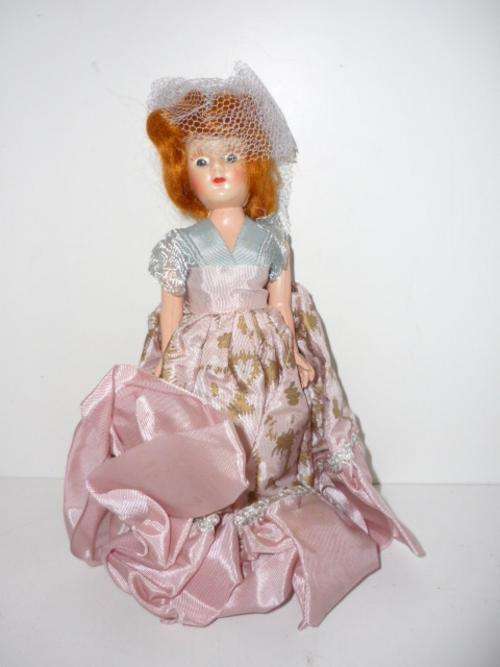 VINTAGE DOLL-BEAUTIFULLY DRESSED-19CM TALL-EYES OPEN AND SHUT